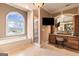 Large bathroom with a glass enclosed shower, a soaking tub, and a vanity at 1198 Elliot Rd, Mcdonough, GA 30252