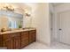 Bathroom featuring granite countertops, wood cabinets, and tile flooring at 1198 Elliot Rd, Mcdonough, GA 30252