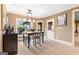 Formal dining room featuring carpet floor, table for four and modern light fixtures at 1198 Elliot Rd, Mcdonough, GA 30252