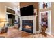 Fireplace featuring white mantel and dark granite hearth set against a brown accent wall at 1198 Elliot Rd, Mcdonough, GA 30252