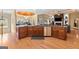 Spacious kitchen featuring granite countertops and stainless steel appliances with hardwood flooring at 1198 Elliot Rd, Mcdonough, GA 30252