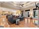Open-concept living room featuring fireplace, hardwood floors, and glass doors to patio at 1198 Elliot Rd, Mcdonough, GA 30252