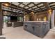 Inviting covered patio featuring a hot tub, outdoor seating, and stylish design at 1198 Elliot Rd, Mcdonough, GA 30252