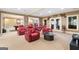 Theater room complete with red recliners, a large screen, and movie-themed decor, great for entertainment at 1198 Elliot Rd, Mcdonough, GA 30252