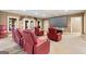 Theater room with plush seating and a large screen, perfect for movie nights and entertainment at 1198 Elliot Rd, Mcdonough, GA 30252