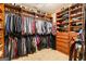 Walk-in closet with custom shelving and storage for clothes, shoes and accessories at 1198 Elliot Rd, Mcdonough, GA 30252