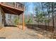 This property has a sloped backyard with a wood fence and wooden deck at 88 Hardy Water Dr, Lawrenceville, GA 30045