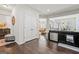 Modern kitchen with stainless steel appliances and an open view to dining area at 88 Hardy Water Dr, Lawrenceville, GA 30045