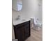 Bright bathroom featuring a modern vanity and new fixtures, tub, and tile at 138 Plantation Cir, Clarkston, GA 30021