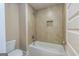 Bathroom with tiled tub and shower at 204 Shelton Dr, Mcdonough, GA 30252