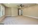 Large carpeted bedroom with fan, windows, and recessed lighting at 204 Shelton Dr, Mcdonough, GA 30252