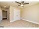 Bedroom featuring neutral walls, a large window, a ceiling fan, and a closet at 204 Shelton Dr, Mcdonough, GA 30252