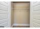 Walk-in closet with wire shelving, carpeted floor and neutral-colored walls at 204 Shelton Dr, Mcdonough, GA 30252