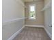 Walk-in closet with carpet and wire shelving at 204 Shelton Dr, Mcdonough, GA 30252