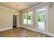 Bright dining area with backyard view and access to pantry at 204 Shelton Dr, Mcdonough, GA 30252