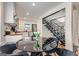 Bright dining area adjacent to staircase featuring modern stairs, hardwood floors, and modern decor at 1471 Hardin Ave, College Park, GA 30337