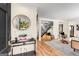 Stylish entryway with modern decor, wood floors, and an open staircase at 1471 Hardin Ave, College Park, GA 30337