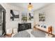 Stylish living room featuring modern decor, wood floors, and ample natural light at 1471 Hardin Ave, College Park, GA 30337