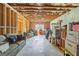 Unfinished basement with exposed framing and natural light, offering potential for customization and additional living space at 624 Bexley Rd, Moreland, GA 30259