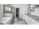 Bathroom features a soaking tub, tiled shower, and granite countertops at 624 Bexley Rd, Moreland, GA 30259