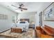 Comfortable bedroom with hardwood floors and a ceiling fan at 624 Bexley Rd, Moreland, GA 30259