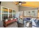 Relaxing screened-in porch with comfortable seating for relaxing and enjoying the view at 624 Bexley Rd, Moreland, GA 30259