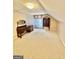 Bedroom with light carpet and neutral walls offering a blank canvas for personalization at 230 White Rd, Fayetteville, GA 30214
