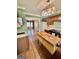 Practical kitchen design with tiled floors, butcher block island, and access to dining and living areas at 230 White Rd, Fayetteville, GA 30214