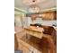Bright kitchen with tiled floors, ample counter space, and an butcher block island at 230 White Rd, Fayetteville, GA 30214