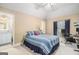 Cozy bedroom with vaulted ceilings, a connecting bathroom, and carpeted floors at 1209 Persimmon Way, Mcdonough, GA 30252