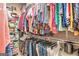 Organized closet featuring hanging clothes and shoe storage, maximizing space at 1209 Persimmon Way, Mcdonough, GA 30252