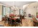 Elegant dining room featuring hardwood floors and a decorative chandelier at 1209 Persimmon Way, Mcdonough, GA 30252