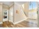 Bright foyer with high ceilings, hardwood floors, and staircase at 1209 Persimmon Way, Mcdonough, GA 30252