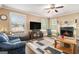 Cozy living room with fireplace and natural light at 1209 Persimmon Way, Mcdonough, GA 30252
