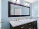 This stylish bathroom features dual sinks, modern countertops, and updated fixtures at 1379 Keys Lake Ne Dr, Brookhaven, GA 30319
