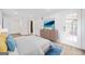 Airy bedroom featuring LVP flooring, a private door to the outside, and new interior paint at 1379 Keys Lake Ne Dr, Brookhaven, GA 30319