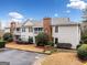 Charming townhouse featuring a brick chimney, exterior balcony, and designated parking at 1379 Keys Lake Ne Dr, Brookhaven, GA 30319