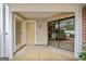 Covered patio with sliding glass doors for indoor-outdoor living, ample natural light at 1379 Keys Lake Ne Dr, Brookhaven, GA 30319
