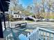 Expansive back deck with built-in seating and lush backyard views at 114 Rolling Grn, Peachtree City, GA 30269