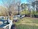 Expansive back deck with built-in seating and backyard views at 114 Rolling Grn, Peachtree City, GA 30269