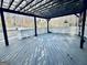 Back deck featuring a wooden pergola with string lights at 114 Rolling Grn, Peachtree City, GA 30269