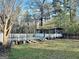 Beautiful backyard with a spacious deck and pergola at 114 Rolling Grn, Peachtree City, GA 30269