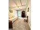 Versatile bonus room with a comfortable daybed, built-in cabinet, and access to the outside balcony at 114 Rolling Grn, Peachtree City, GA 30269