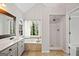 Bright bathroom featuring a tub with mosaic tile detail and a separate shower at 505 Summer Ter, Woodstock, GA 30189