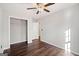 Bedroom featuring hardwood floors, large closet and natural light from windows at 505 Summer Ter, Woodstock, GA 30189