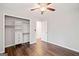 Bedroom featuring a closet and hardwood floors, with ample natural light from windows at 505 Summer Ter, Woodstock, GA 30189