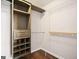 Custom closet featuring built-in shelving and drawers, as well as hanging rods at 505 Summer Ter, Woodstock, GA 30189