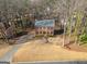 Exterior of a home surrounded by trees at 505 Summer Ter, Woodstock, GA 30189