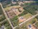 An aerial view shows homesites and landscape of a real estate community at 296 Beavers Rd, Grantville, GA 30220
