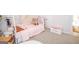 Close up on bright bedroom, showcasing cozy decor, and a charming, playful atmosphere at 296 Beavers Rd, Grantville, GA 30220